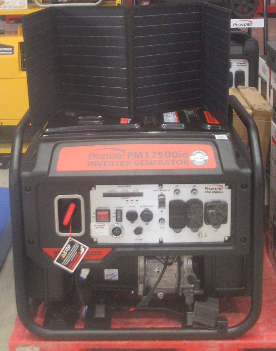 A red and black open-frame gasoline inverter generator inside a black tube frame, for storm prep in Iowa City, IA